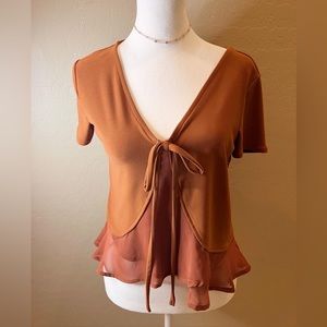 Beautiful burnt orange top. Brand is bar III. Size small.